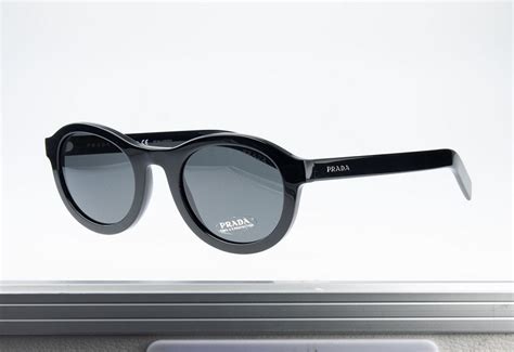 how to tell fake prada sunglasses|prada sunglasses serial number check.